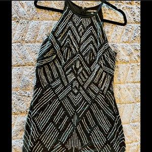 Black sequin cocktail dress. Gianni Binni size 8. New without tag. Never worn.